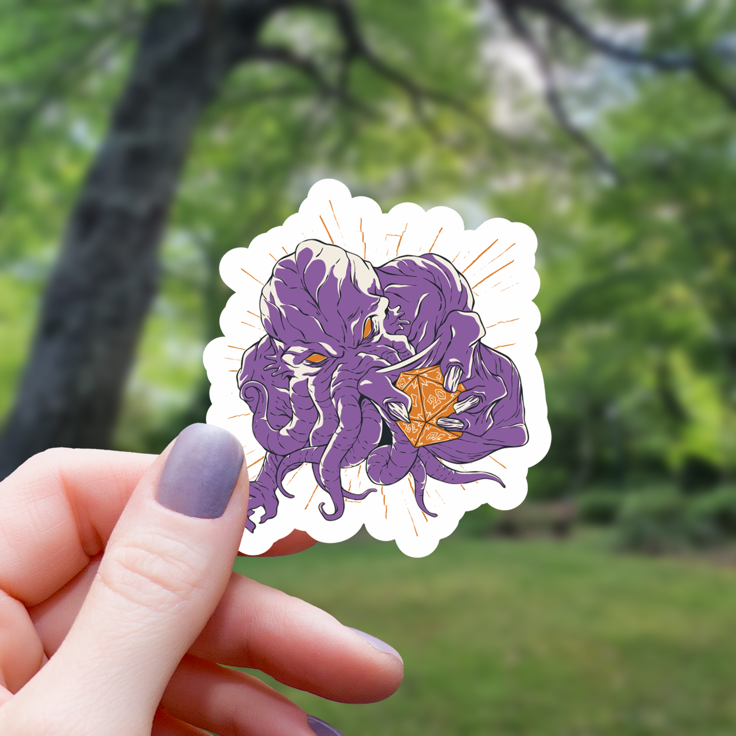 Cthulhu Holding a Polyhedral Dice Sticker - 3"