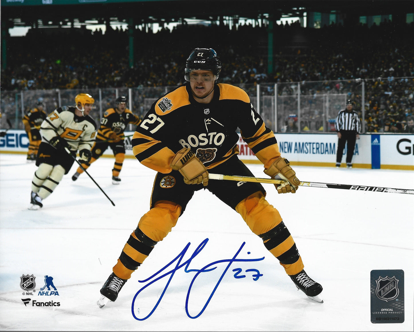 Hampus Lindholm 2023 Winter Classic Action Boston Bruins Autographed 8" x 10" Hockey Photo