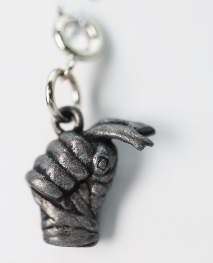 Traveler's Trinkets: Fist with Handwraps Charm
