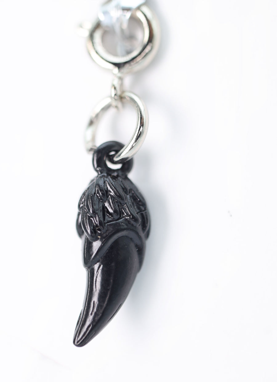 Traveler's Trinkets: Dragon Fang Charm