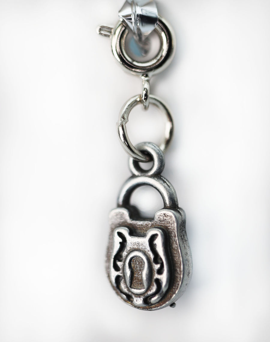 Traveler's Trinkets: Lock Charm
